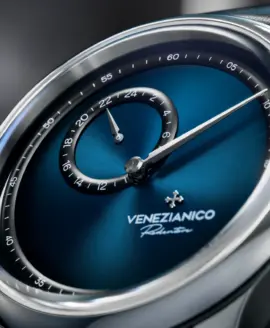 watch blue dial close up with 24h sub dial